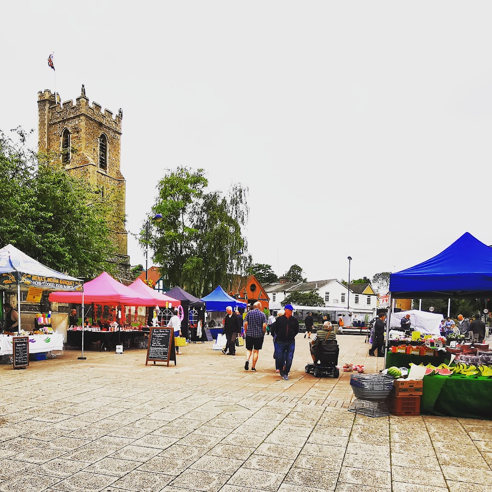 Busy Haverhill Market Day on the Market Square with St Marys Church in the background